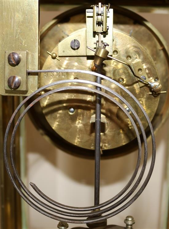 A late 19th century French four glass mantel clock, 14in.